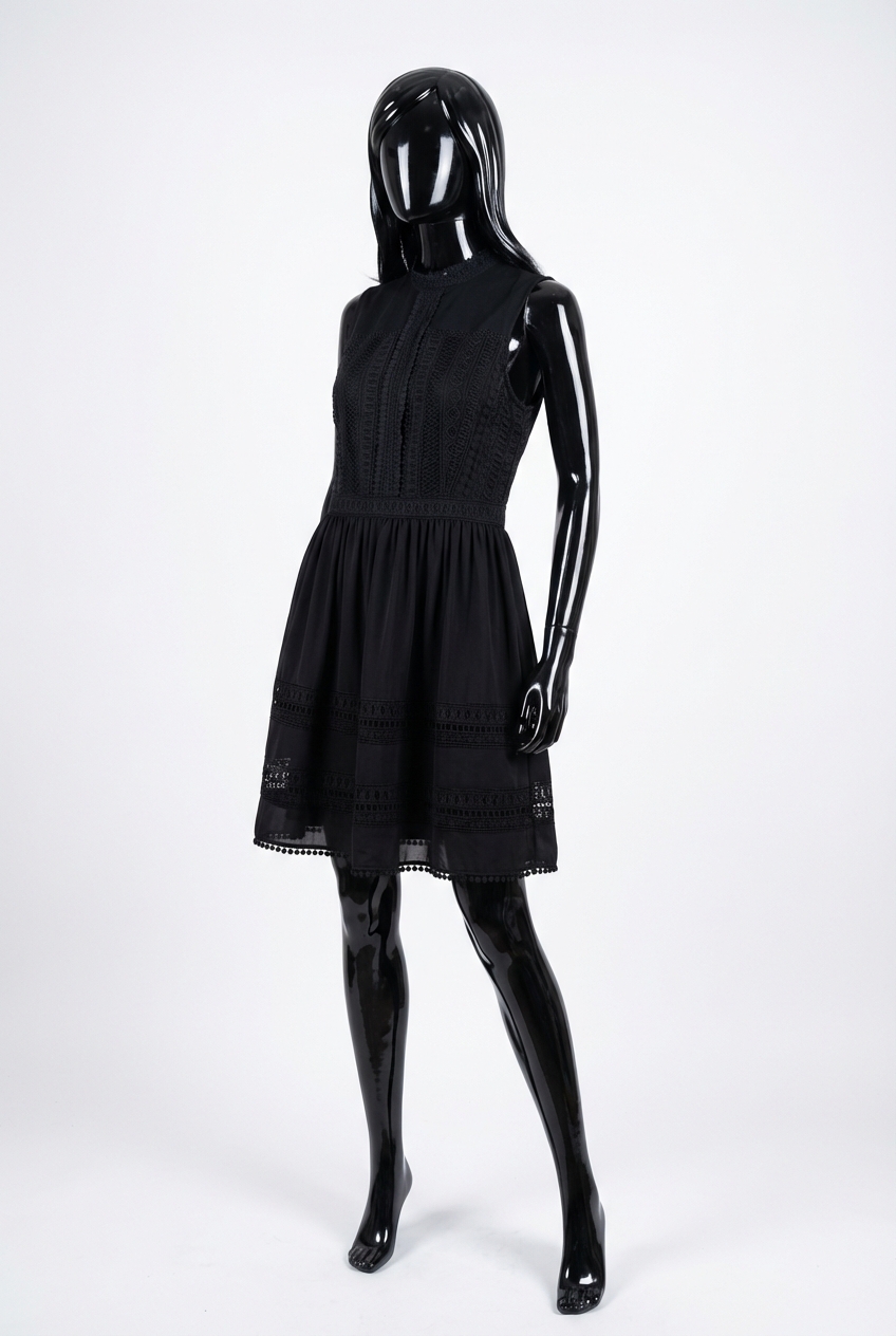a glossy black plastic mannequin with no facial features in Allsaints black high neck dress size 12 arching their back slightly for a dynamic pose, in a clean photo studio with seamless white backdrop and softbox lighting.