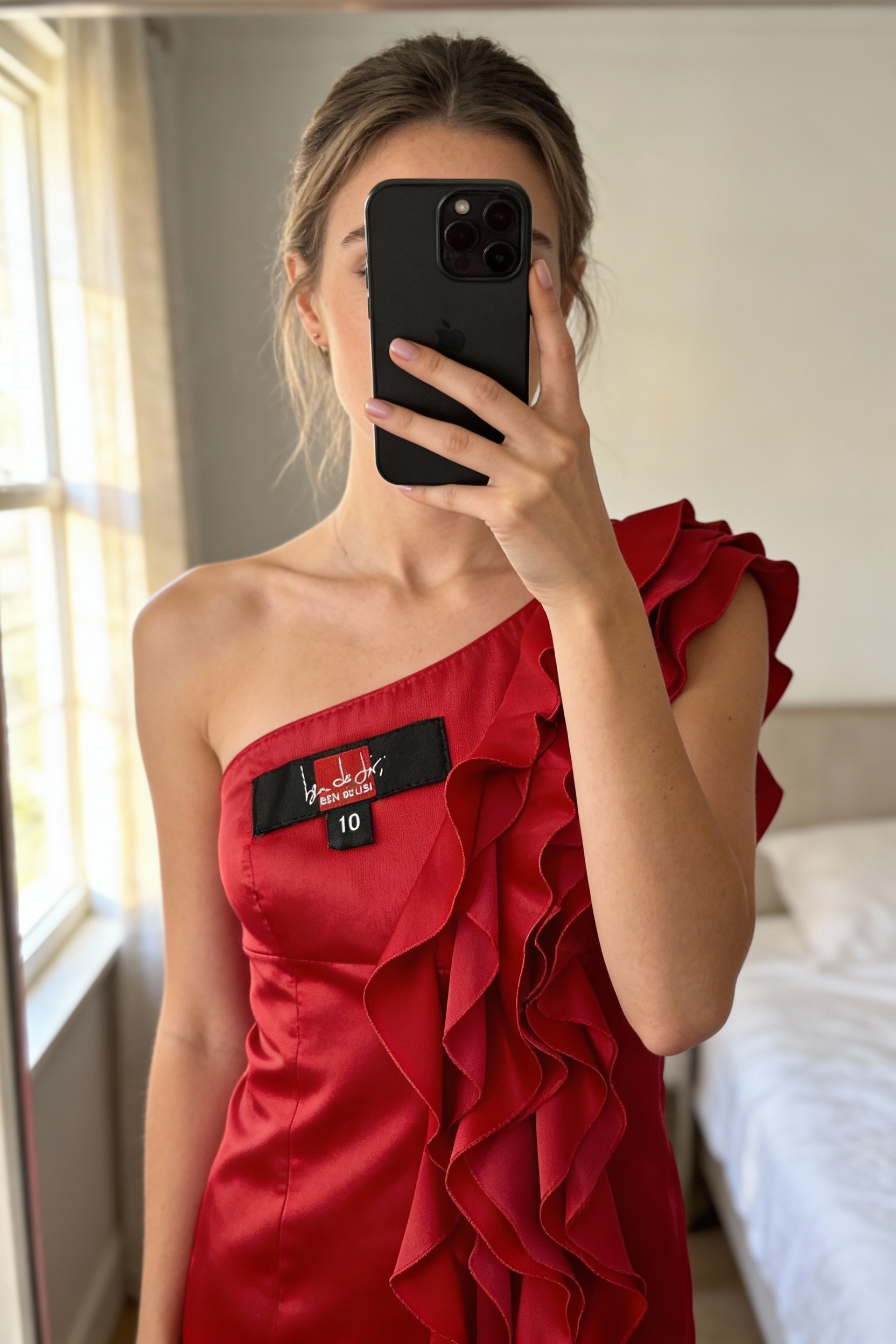 Stunning Ben De Lisi cocktail dress suit wedding guest size 10 immaculate standing straight facing the camera, in a softly lit bedroom setting, with gentle natural light filtering through a window.