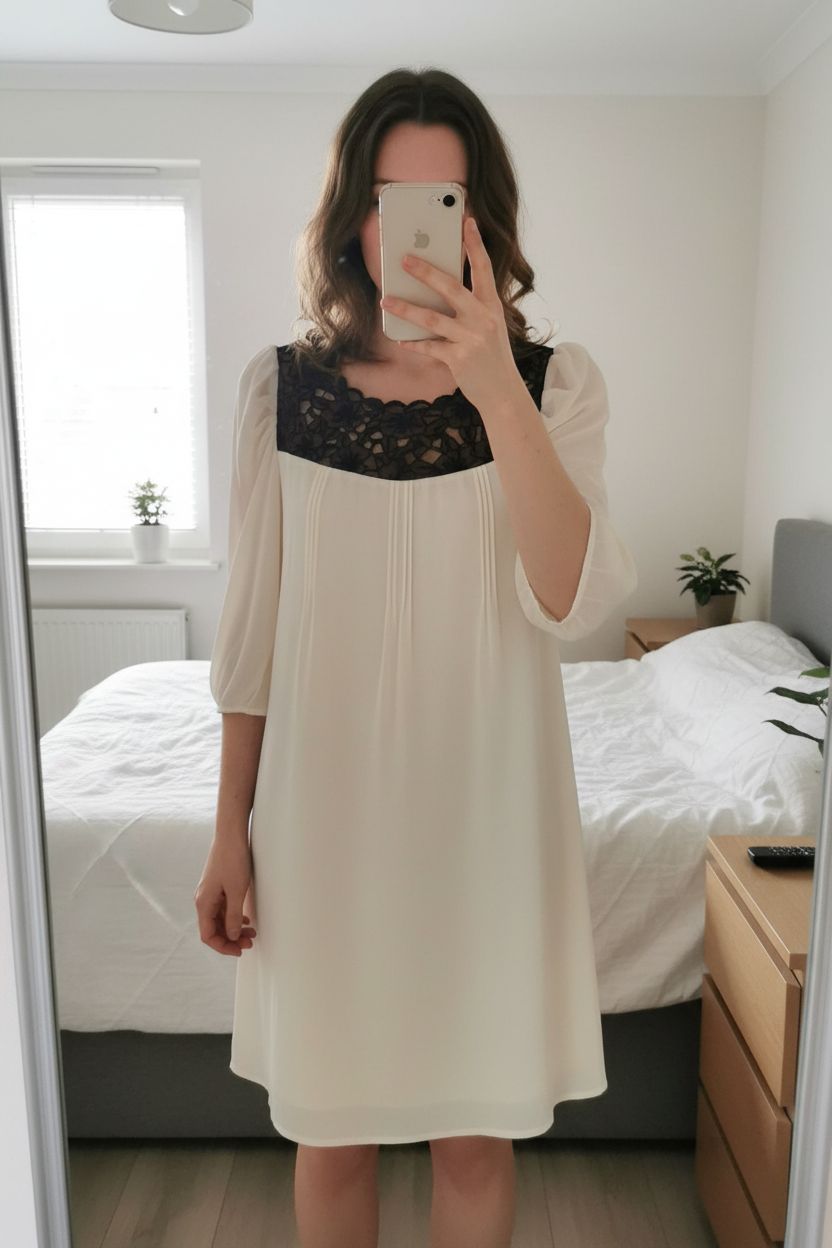 Oasis Cream Shift Dress UK 12 Romantic Lace Puff Sleeves Party Occasion Unworn standing straight facing the camera, in a softly lit bedroom setting, with gentle natural light filtering through a window.