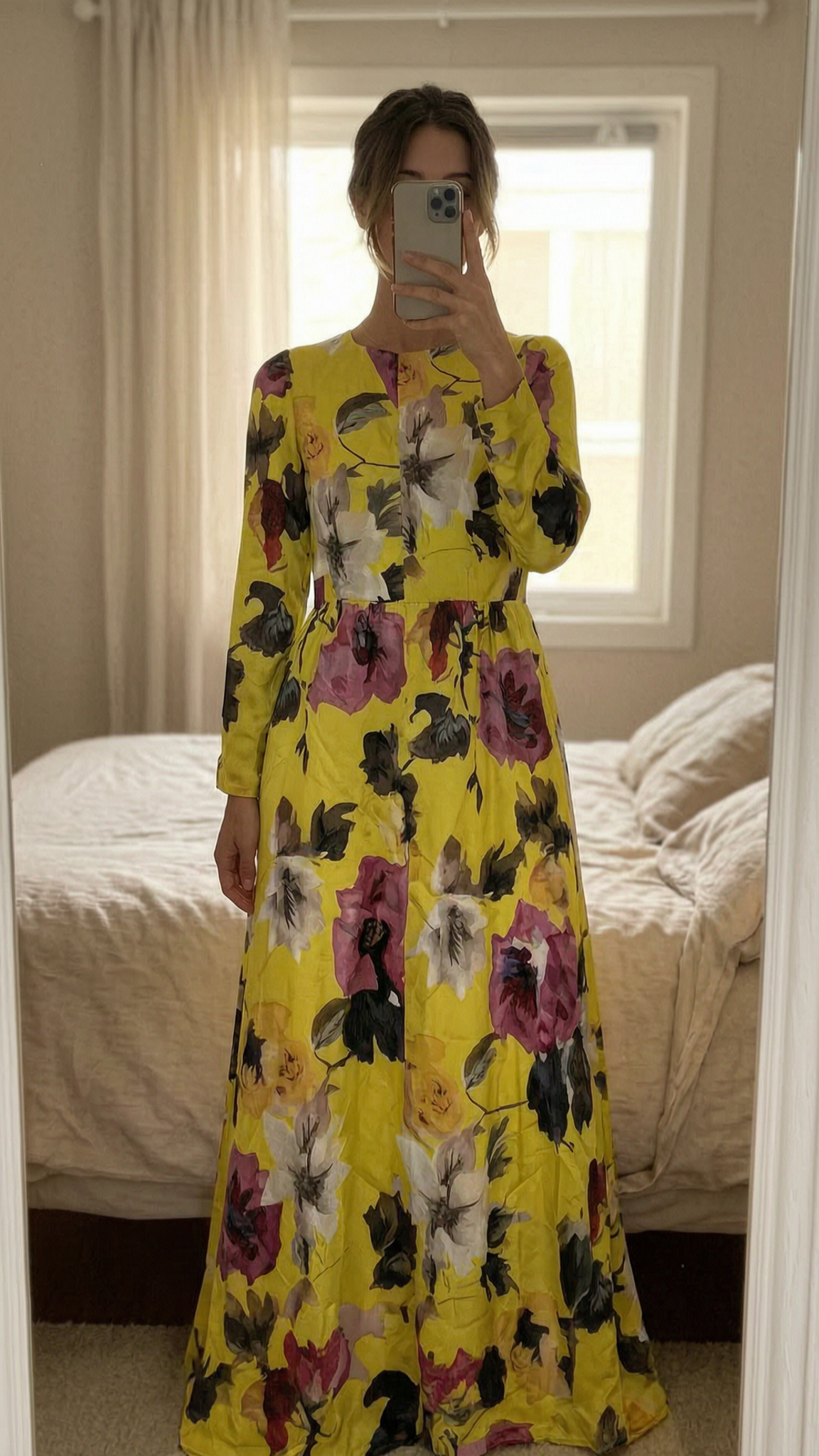 A person in Gucci Floral Maxi Dress Yellow Silk Blend standing straight facing the camera, in a softly lit bedroom setting, with gentle natural light filtering through a window.